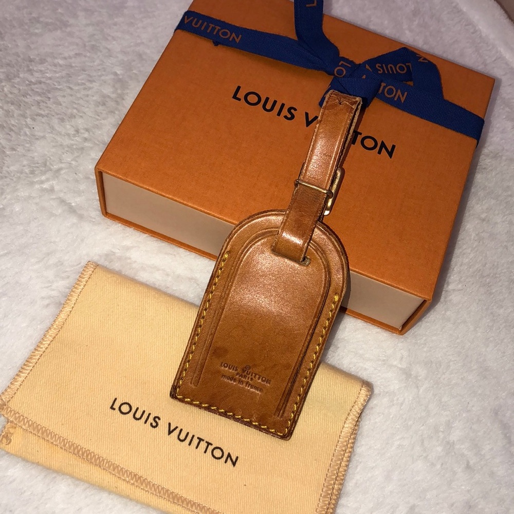 Louis Vuitton vachetta leather patina luggage tag